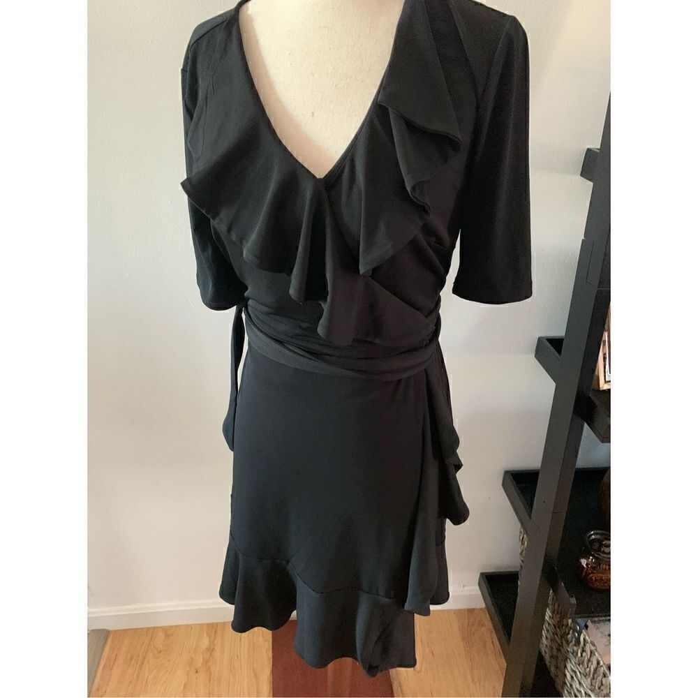 The limited black wrap dress size s Y2K
